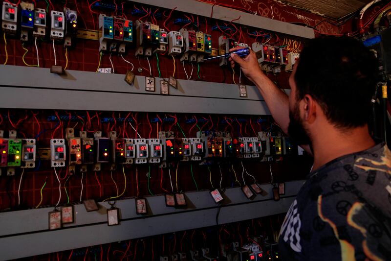 Switches to transfer electricity to private homes in Baghdad. AP