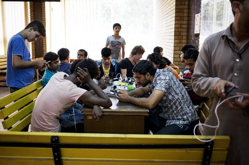 Asylum seekers at the Adasevci camp. Christopher Pike / The National