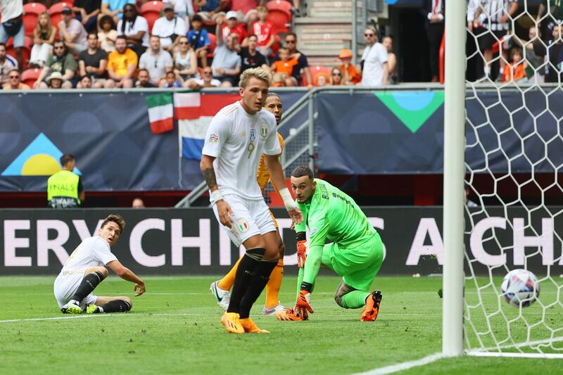 Italy's Federico Chiesa scores their third goal past the Netherlands' Justin Bijlow. Reuters