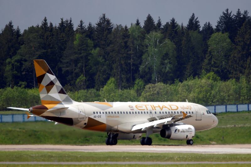 FILE PHOTO: A plane of Etihad Airways company is seen at Minsk international airport near the village of Slabada, Belarus, May 19, 2016.  REUTERS/Vasily Fedosenko/File Photo