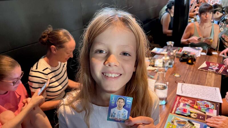 Betsy Pearl Smedley finally lands Lionel Messi for her Qatar World Cup sticker album. Photo: Simon Smedley