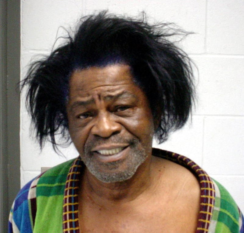James Brown after his arrest in January 2004 for criminal domestic violence. Getty Images