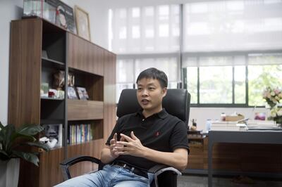 He Xiaoping, co-founder and chairman of Xpeng Motors Technology Ltd., speaks during an interview in Guangzhou, China, on Wednesday, June 6, 2018. Though Xpeng hasn't delivered a single vehicle, doesn't own a factory and hasn't obtained a production license from the government, the Chinese electric automaker expects to raise more than $600 million this month from investors that include Alibaba, valuing it close to $4 billion, according to a person familiar with the fundraising. Photographer: Giulia Marchi/Bloomberg