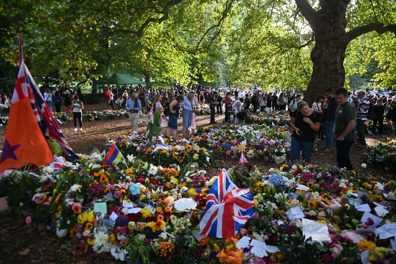 Flowers, cards and messages left in St James's Park in London. EPA