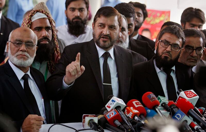Pakistani lawyers who are contesting the case against Asia Bib speak to media outside the Supreme court. AP Photo