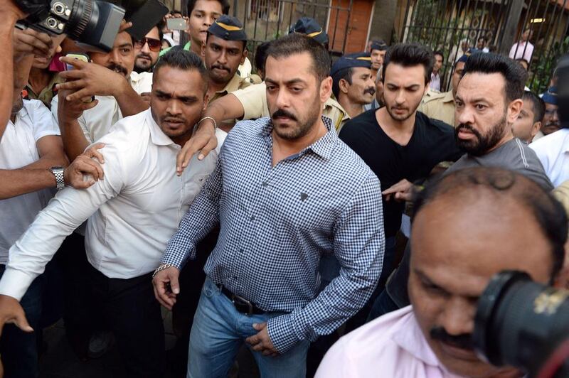 Salman Khan walks from Bombay High Court in Mumbai on December 10, 2015, after being acquitted of culpable homicide. AFP 

