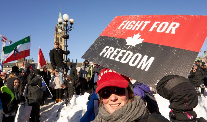 A few protesters wore masks but many were in balaclavas due to the cold. EPA