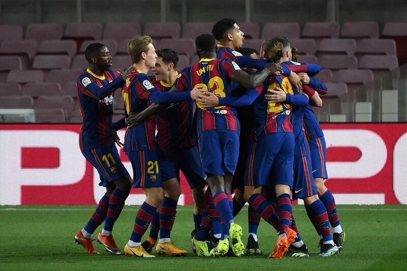 Barcelona's players celebrate after Lionel Messi's goal. AFP