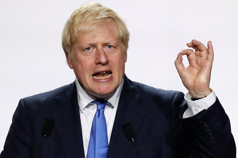 FILE - In this Monday, Aug. 26, 2019 file photo, Britain's Prime Minister Boris Johnson gestures during his final press conference at the G7 summit  in Biarritz, southwestern France. Boris Johnson is getting tough with members of his Conservative Party who oppose his Brexit plans at the start of what promises to be a momentous week in British politics.
The so-called "rebels" are being warned Monday Sept. 2, 2019, that they will be expelled from the party if they take part in efforts led by opposition parties in Parliament meant to block a departure from the European Union without a deal. (AP Photo/Francois Mori, File)