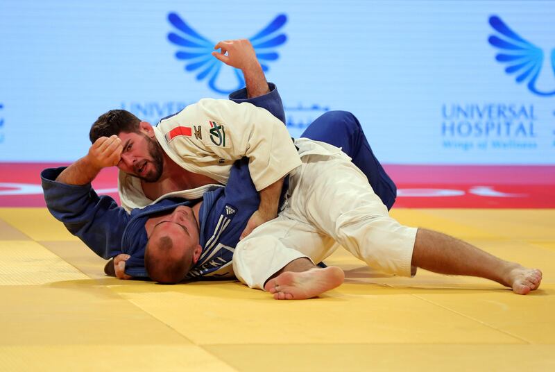 Abu Dhabi, United Arab Emirates - October 28th, 2017: Cyrille Maret (white) competes against Maciej Sarnacki in the Gold medal match in the +100kg weight category at the ninth staging of the Abu Dhabi Grand Slam which is the fourth of the five World Tour events of the International Judo. Saturday, October 28th, 2017 at Corniche, Abu Dhabi. Chris Whiteoak / The National