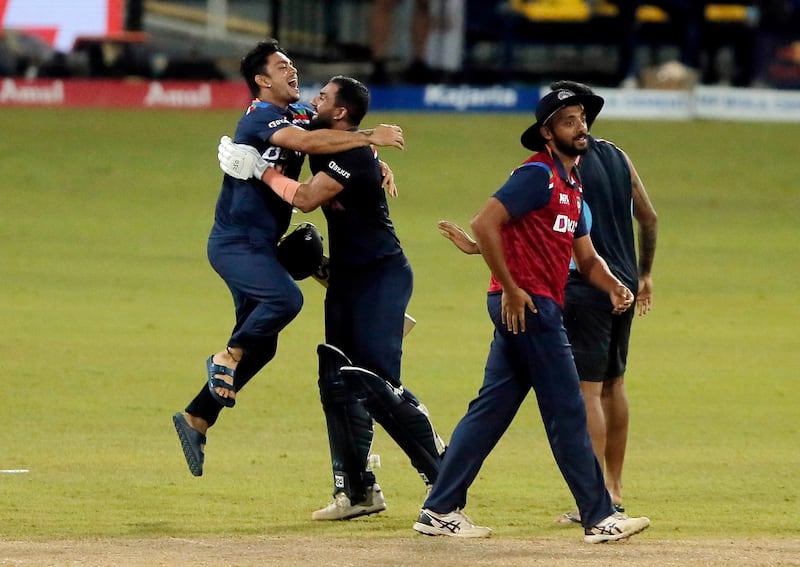 India's Deepak Chahar celebrates with Bhuvneshwar Kumar after winning the second ODi in Colombo.