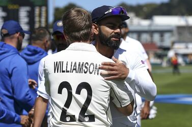 Virat Kohli of India and Kane Williamson of New Zealand shake hands at the end of the First Test. Getty