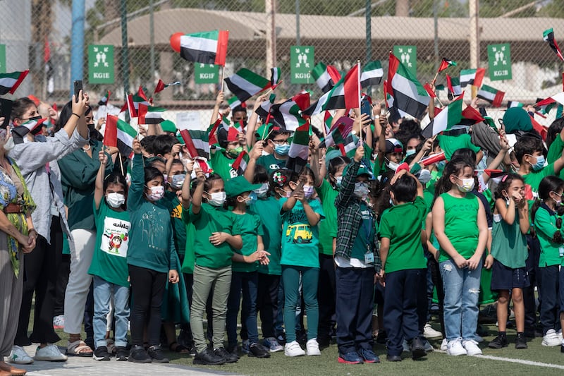 Wearing the green of the UAE flag, pupils get into the festival spirit. Antonie Robertson / The National