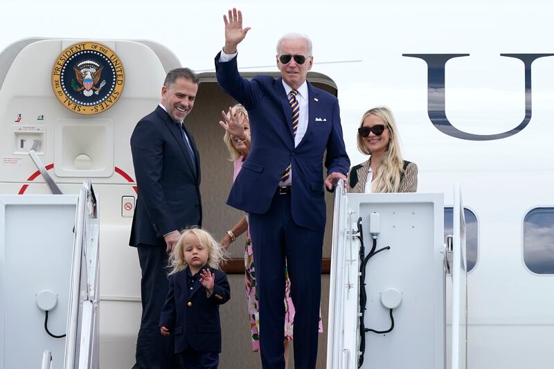 President Joe Biden waves as he leaves for a beach holiday with son Hunter, grandson Beau, first lady Jill Biden, and daughter-in-law Melissa Cohen, before boarding Air Force One. AP