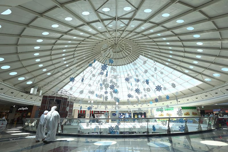 Al Ain Mall is popular with Emiratis and has restarted its expansion plan, with a Carrefour hypermarket expected to open next year. Satish Kumar / The National  