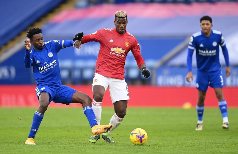 Paul Pogba of Manchester United is challenged by Wilfred Ndidi of Leicester City. Getty