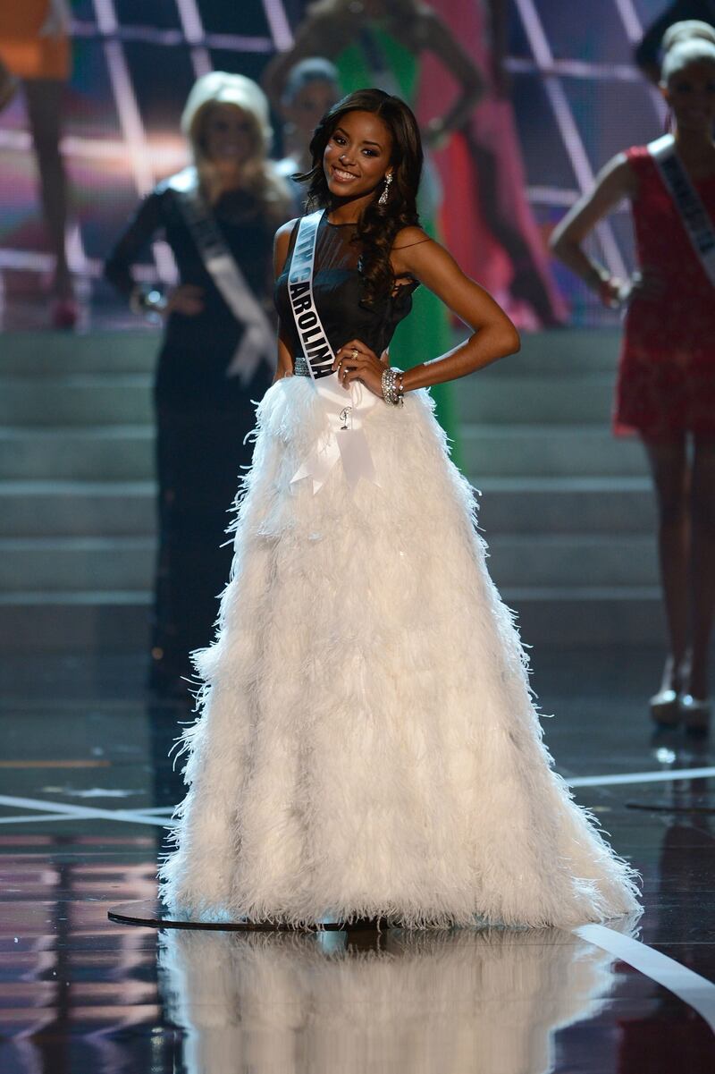 Miss South Carolina Megan Pickney walks the runway during the introductions of the Miss USA 2013 pageant, Sunday, June 16, 2013, in Las Vegas. (AP Photo/Jeff Bottari) *** Local Caption ***  Miss USA 2013.JPEG-024a8.jpg