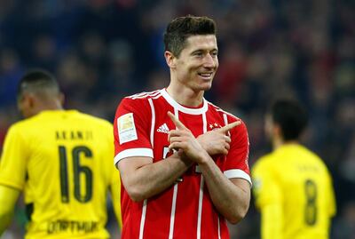 Soccer Football - Bundesliga - Bayern Munich vs Borussia Dortmund - Allianz Arena, Munich, Germany - March 31, 2018   Bayern Munich's Robert Lewandowski celebrates scoring their sixth goal to complete his hat-trick    REUTERS/Michaela Rehle    DFL RULES TO LIMIT THE ONLINE USAGE DURING MATCH TIME TO 15 PICTURES PER GAME. IMAGE SEQUENCES TO SIMULATE VIDEO IS NOT ALLOWED AT ANY TIME. FOR FURTHER QUERIES PLEASE CONTACT DFL DIRECTLY AT + 49 69 650050