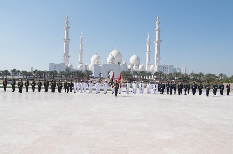 ABU DHABI, UNITED ARAB EMIRATES - November 30, 2017: Members of the UAE Armed Forces observe a moment of silence during a Commemoration Day flag raising ceremony at Wahat Al Karama, a memorial dedicated to the memory of UAE’s National Heroes in honour of their sacrifice and in recognition of their heroism.

( Saeed Al Neyadi / Crown Prince Court - Abu Dhabi )
---
