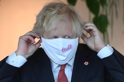 Britain's Prime Minister Boris Johnson visiting the energy company Bulb in Liverpool, in June. The business is reportedly seeking a bailout and ministers are not ruling out nationalisation. Getty Images