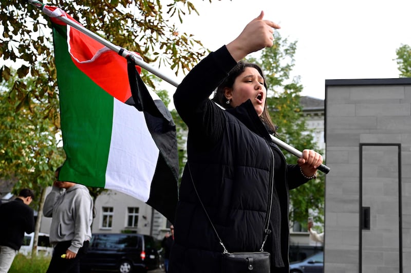 A pro-Palestinian demonstrator makes her point in Berlin. AFP