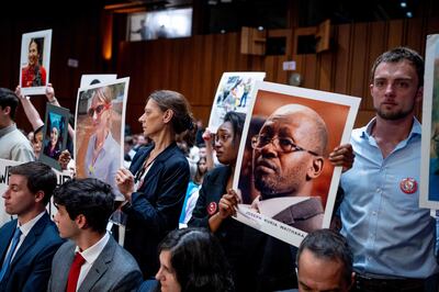 Family members of those who died on Ethiopian Airlines Flight 302 and Lion Air Flight0 610, as Boeing chief Dave Calhoun appears before a Senate panel hearing on June 18. AFP