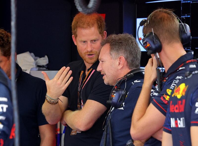 Prince Harry with Red Bull team principal Christian Horner. Reuters