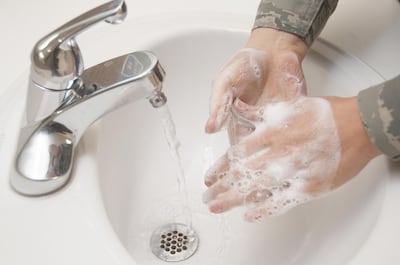 An Airman washes her hands with soap and water at Wilford Hall Ambulatory Surgical Center, Joint Base San Antonio Lackland, Texas Dec. 13, 2012. Hand washing is one of the most effective ways to prevent the spread of many types of infection and illness in all environments. (U.S. Air Force photo/Staff Sgt. Corey Hook)

