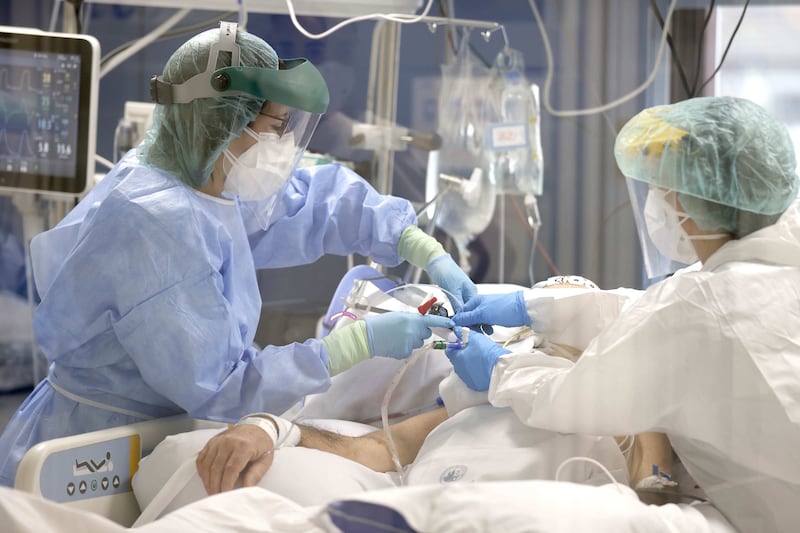 Nurses take care of a Covid-19 patient at the Basurto Hospital in Bilbao, Spain. EPA