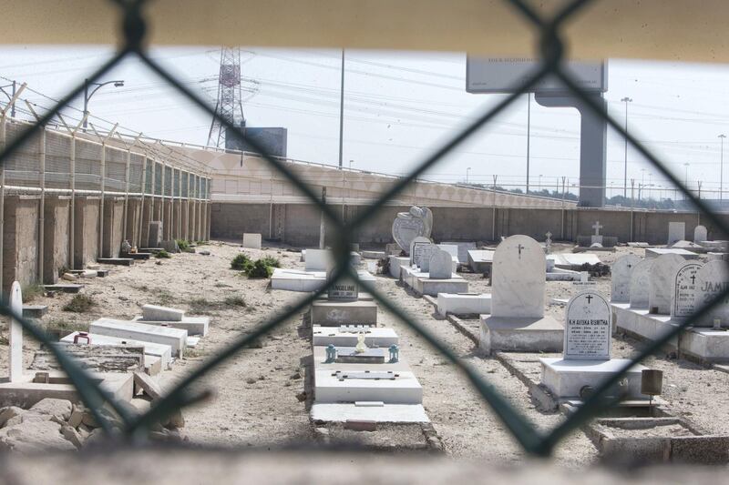 ABU DHABI, UNITED ARAB EMIRATES - Tombs at Sas Al Nakhel Cemetery, Non Muslim.  Ruel Pableo for The National for John Dennehy's story