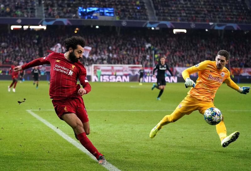 Liverpool's Mohamed Salah (left) scores his side's second goal of the game during the UEFA Champions League match at the Red Bull Arena, Salzburg. (Photo by John Walton/PA Images via Getty Images)