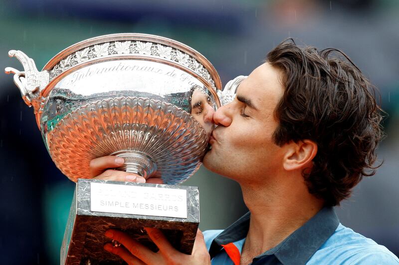 Roger Federer after winning the 2009 French Open. Reuters