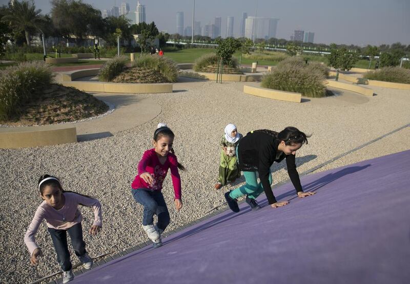 Children play at a park at Salam Street, Abu Dhabi. While finding activities during the summer can be difficult, staying active is vital for children’s health. Silvia Razgova / The National
