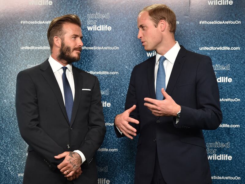 Prince William with former England football player David Beckham at an event to launch the United for Wildlife campaign #WhoseSideAreYouOn, in central London on June 9, 2014. AFP