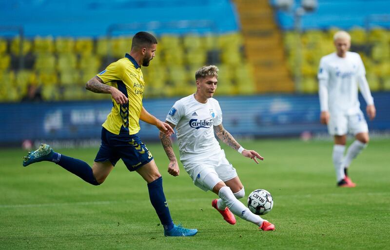 BRONDBY, DENMARK - JUNE 21: Anthony Jung of Brondby IF and Guillermo Varela of FC Copenhagen compete for the ball during the Danish 3F Superliga match between Brondby IF and FC Copenhagen at Brondby Stadion on June 21, 2020 in Brondby, Denmark. (Photo by Lars Ronbog / FrontZoneSport via Getty Images)