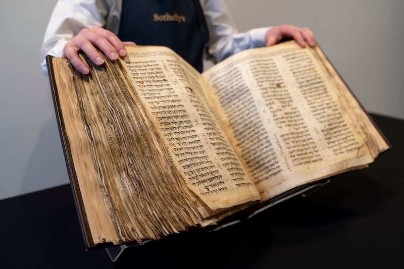 Sotheby's unveils The Codex Sassoon, which went up for auction in New York. AP