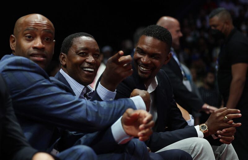 Former NBA players Vince Carter, Isiah Thomas and Chris Bosh before the match. Reuters