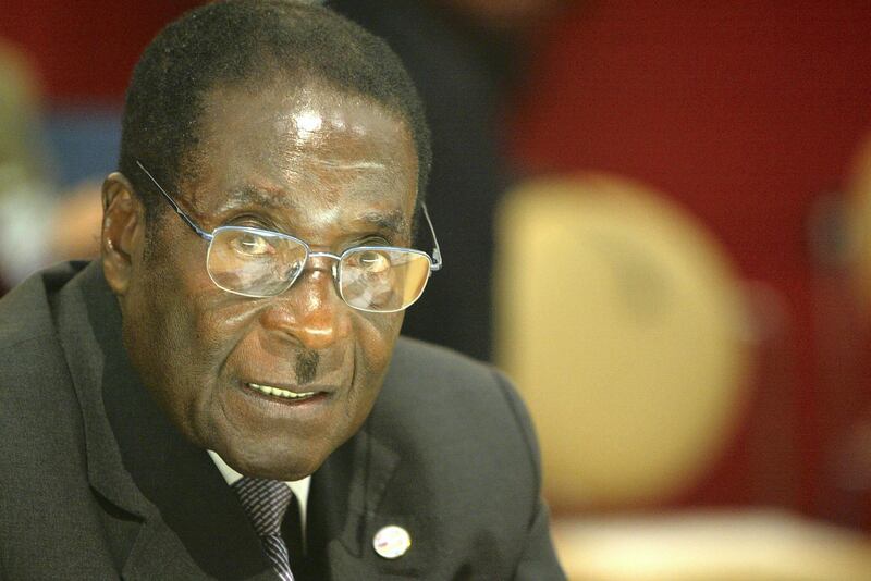 PARIS - FEBRUARY 21:  President of Zimbabwe Robert Mugabe in the 22nd African Heads of State Conference on February 21, 2003 in Paris, France. The Summit will focus on development and investment, Aids/HIV trade and conflict resolution with particular reference to the Ivory Coast.  (Photo by Pascal Le Segretain/Getty Images) 