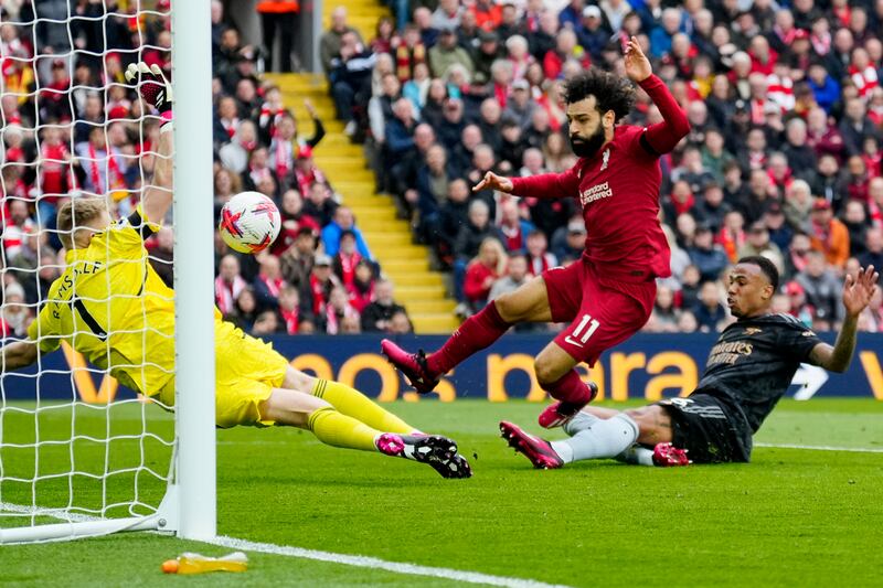 Liverpool's Mohamed Salah scores his side's opening goal. AP