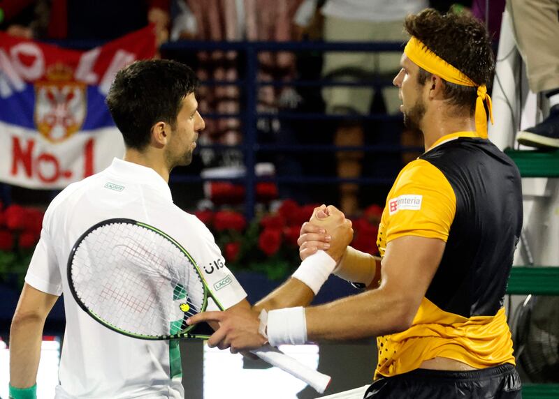 Novak Djokovic congratulates Jiri Vesely after their quarter-final match. AFP