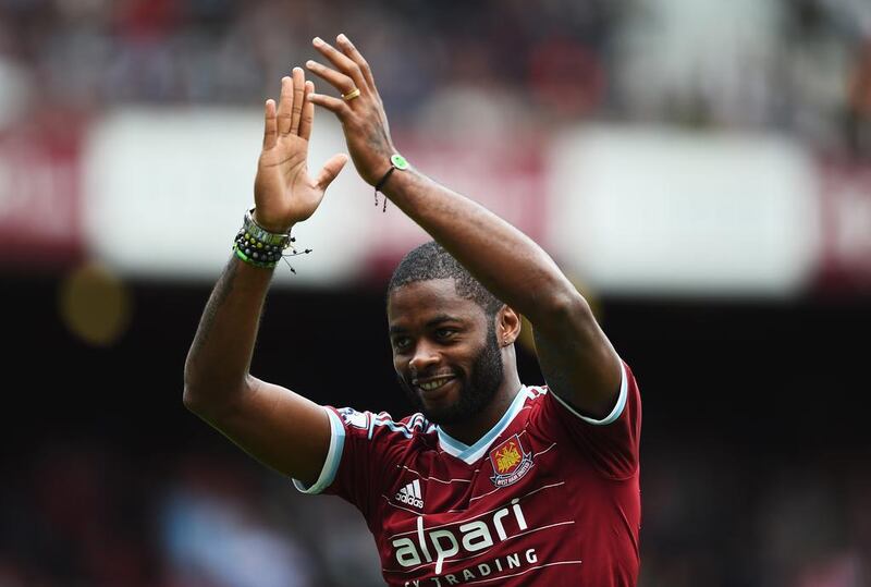 Alex Song of West Ham United applauds the fans as he joins the club on loan prior to the English Premier League match against Southampton at the Boleyn Ground on August 30, 2014, in London, England. Jamie McDonald / Getty Images