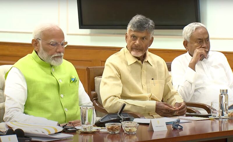 Indian Prime Minister Narendra Modi next to Telugu Desam Party leader N Chandrababu Naidu, center, and Janata Dal (United) leader Nitish Kumar during a meeting at the prime minister's residence in New Delhi on June 5. AP