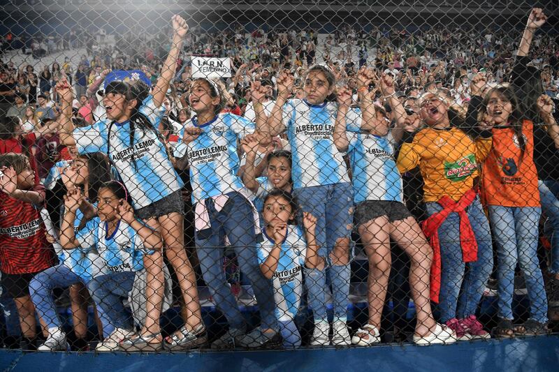 A group of girls reacts after Brazil's Corinthians defeated Colombia's Santa Fe in the Women's Copa Libertadores football final on November 21. AFP