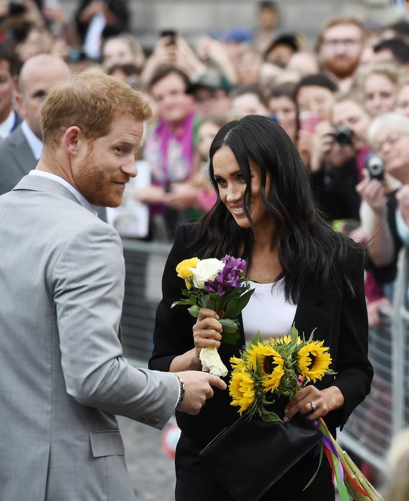 DUBLIN, IRELAND - JULY 11: Prince Harry, Duke of Sussex and Meghan, Duchess of Sussex visit Trinity College on the second day of their official two day royal visit to Ireland on July 11, 2018 in Dublin, Ireland. It is the royal couple's first foreign trip together since they were married earlier this year. (Photo by Charles McQuillan/Getty Images)