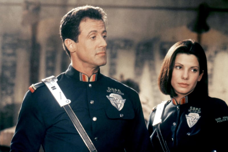 American actors Sylvester Stallone and Sandra Bullock on the set of <Demolition Man> directed by Marco Brambilla. (Photo by Sunset Boulevard/Corbis via Getty Images)