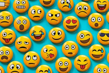 Did you know the smiley face emoji can denote awkwardness among Gen-Z? Getty Images