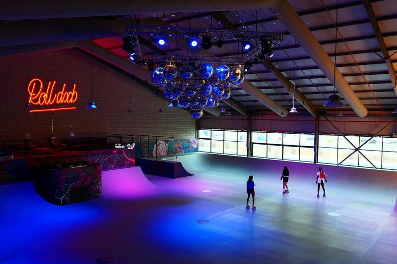 People doing roller skating at the RollDXB roller disco which opens at Shed 3 Marina Cubes Street, Dubai Maritime City, Port Rashid, Bur Dubai on April 25,2021. (Pawan Singh/The National). Story by Sophie Prideaux 