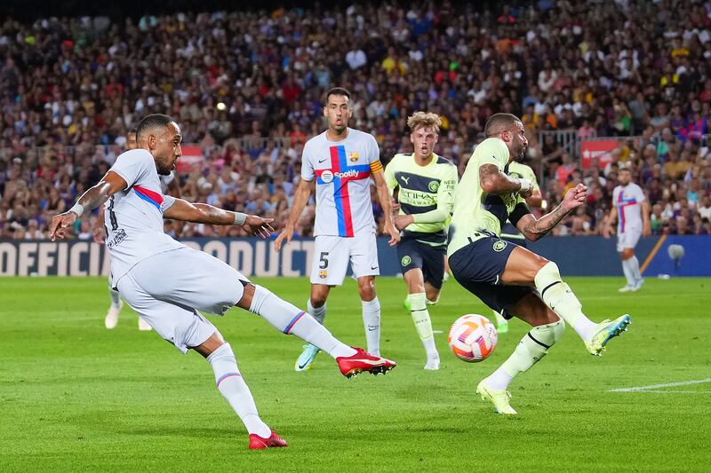 Barcelona's Pierre-Emerick Aubameyang scores against Manchester City in the friendly match at Camp Nou. Getty