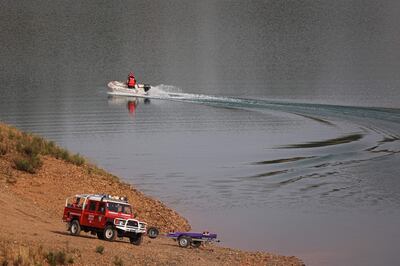 Portuguese police conduct a search at the reservoir. AFP 
