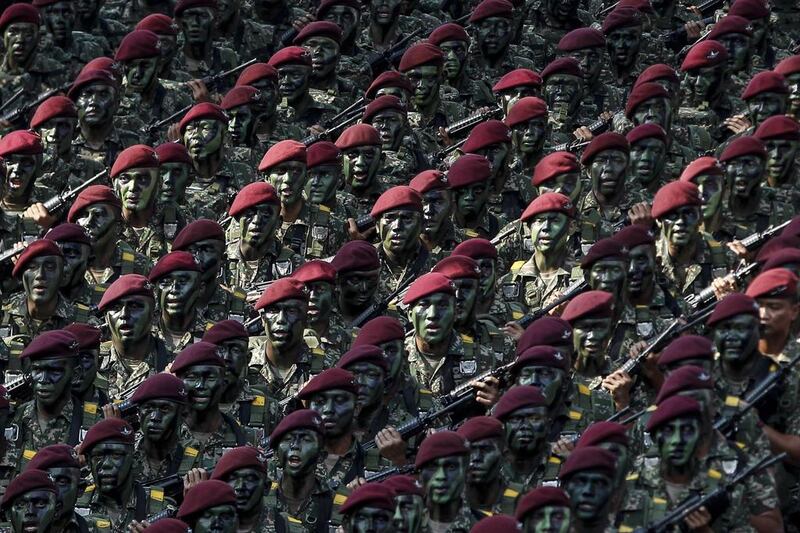 Malaysia’s Army personnel marches during the 59th National Day celebrations at the Independence Square in Kuala Lumpur, Malaysia. Malaysia gained its independence on August 31, 1957. Joshua Paul / AP